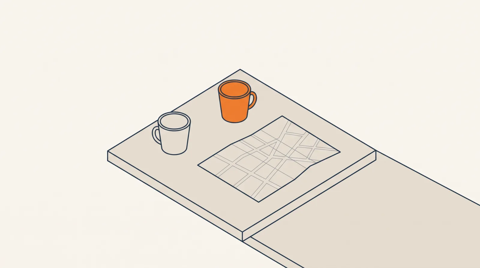 Une table, deux tasses et un plan de blocs déplié